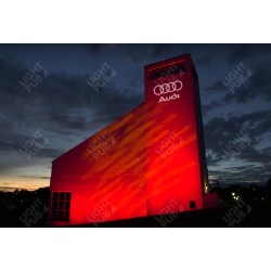 Projection logo lumineux sur façade de bâtiment