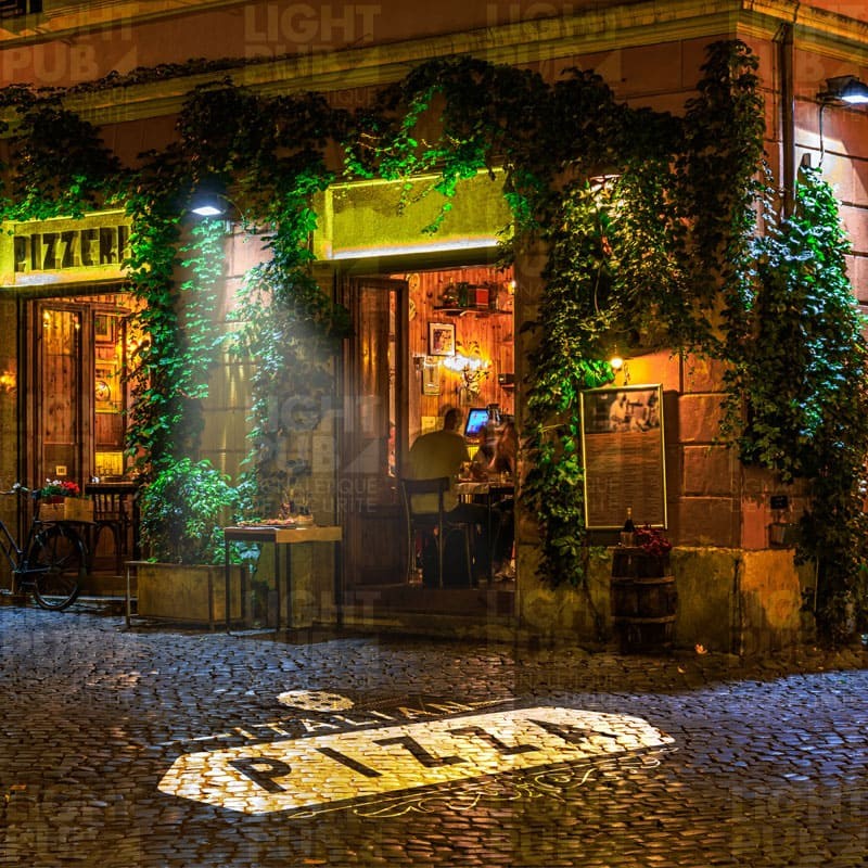 Projection logo lumineuse trottoir rue pour restaurant